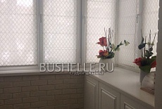 Полупрозрачные римские шторы на балкон